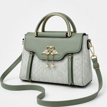 Velora – Swan-Clasp Structured Crossbody Bag with Gold Hardware